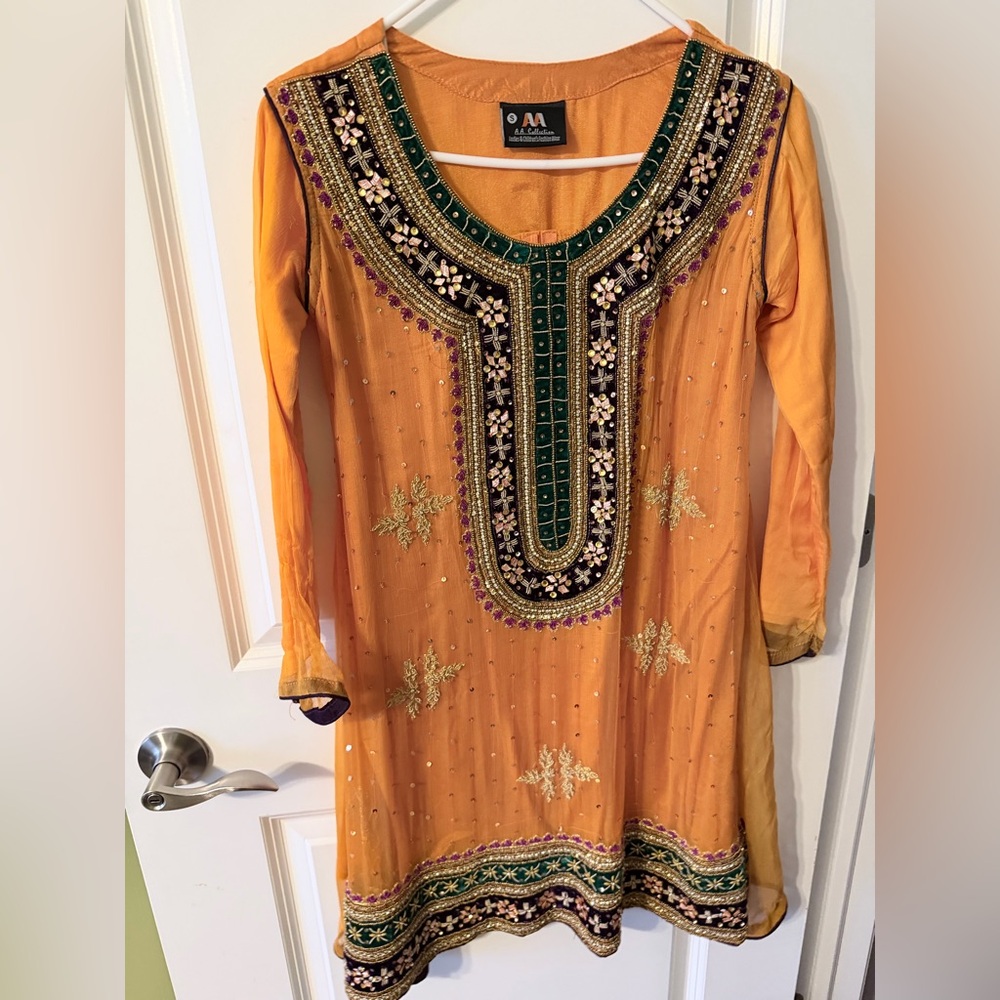 Marigold and purple Embroidered Gharara suit